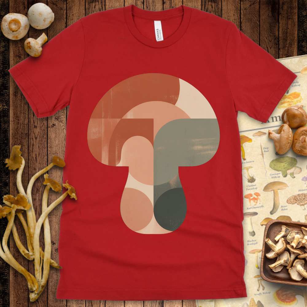 Geometric abstract mushroom design in earthy mid-century modern colors on a graphic tee