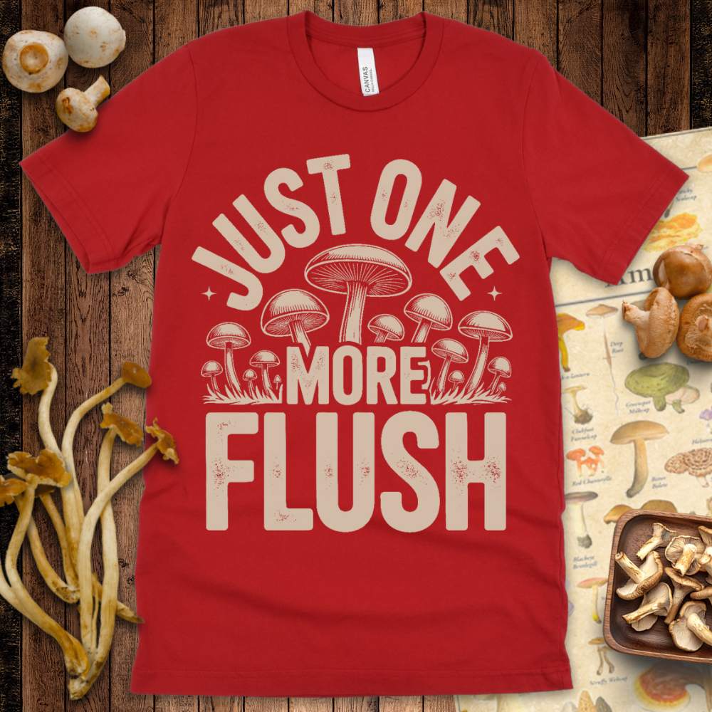 One More Flush Tee featuring the phrase “Just One More Flush” with illustrated mushrooms, ideal for mushroom growers and mycology fans.