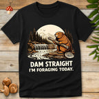Vintage style illustration of a beaver holding a log by a river dam with mountains and pine trees, reading “Dam Straight I’m Foraging Today”.