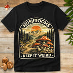 Vintage style illustration of mushrooms with mountain landscape and sunset reading “Mushrooms Keep It Weird”
