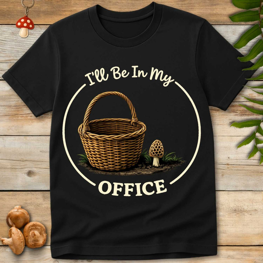 Illustration of a basket and morel mushroom with the phrase “I’ll Be In My Office” in cream text on a black Shirt