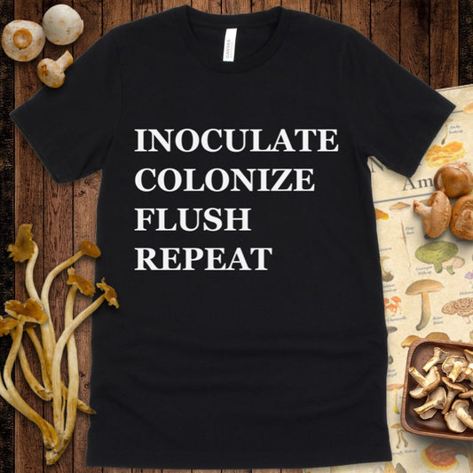 Black t-shirt design with bold white text reading "Inoculate, Colonize, Flush, Repeat" in all caps.