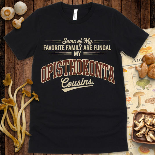 T-shirt design with vintage collegiate text reading “Some of My Favorite Family Are Fungal – My Opisthokonta Cousins” in cream and maroon tones on a distressed background