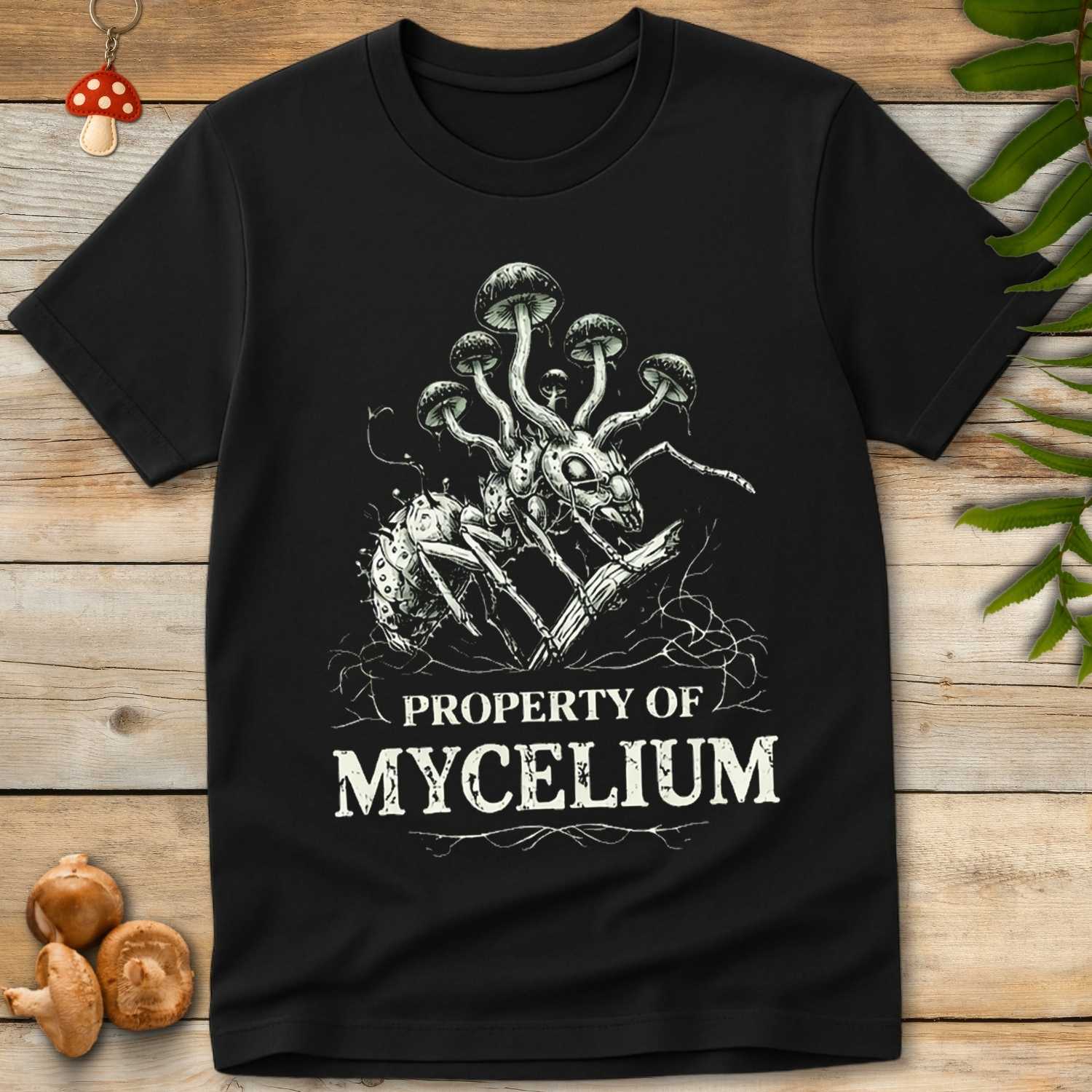 Illustration of an ant infected with cordyceps fungus, mushrooms sprouting from its body, with the caption “Property of Mycelium” beneath twisted root graphics.