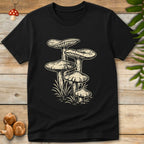 Vintage hand-drawn mushroom cluster sprouting from forest grass on a nature-inspired T-shirt design