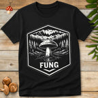 Vintage badge-style mushroom illustration by a lake and mountains with the word “FUNG” as a playful singular version of fungi.
