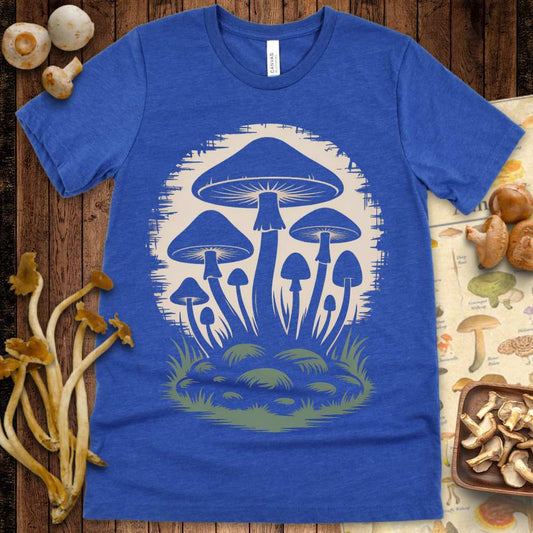 Silhouette of mushrooms on mossy ground with vintage twilight background on a blue T-shirt