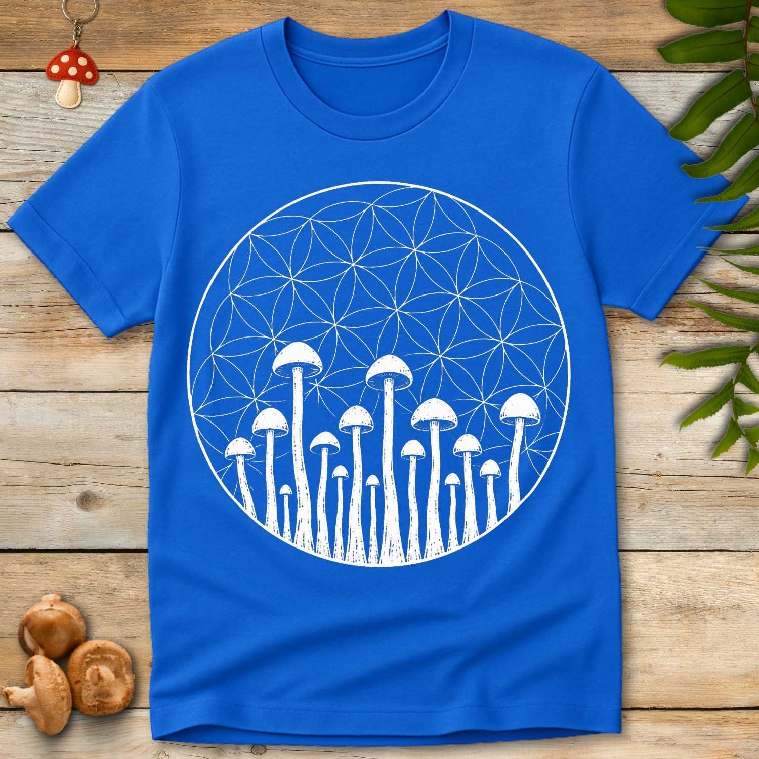 Sacred Shrooms Tee featuring minimalist white mushrooms inside a sacred geometry circle pattern on a black background.