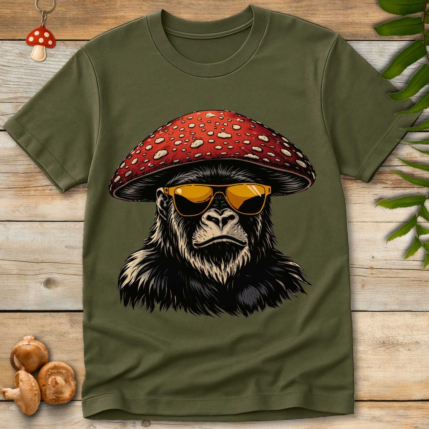 Illustration of a gorilla wearing a red fly agaric mushroom cap and yellow sunglasses in a bold, psychedelic art style.