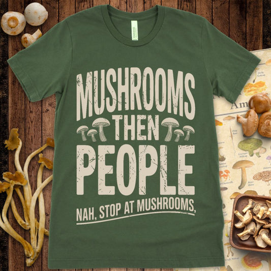 T-shirt design with distressed text reading “Mushrooms Then People, Nah Stop at Mushrooms” with small mushroom illustrations