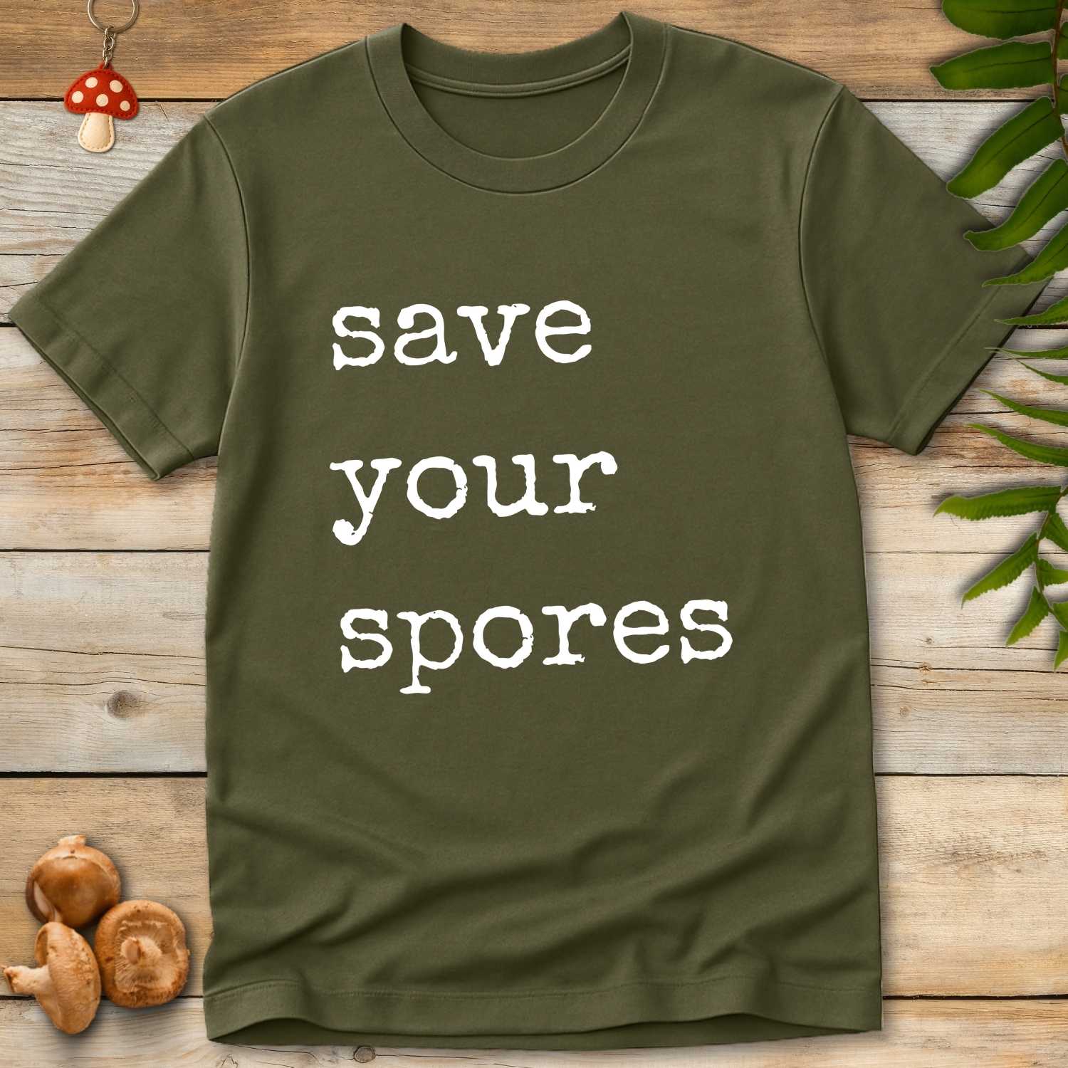 Bold white text reading “save your spores” in vintage typewriter font on black background