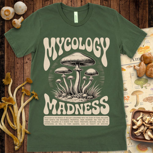 Retro graphic T-shirt design featuring mushrooms and a definition of mycology with bold stylized text.