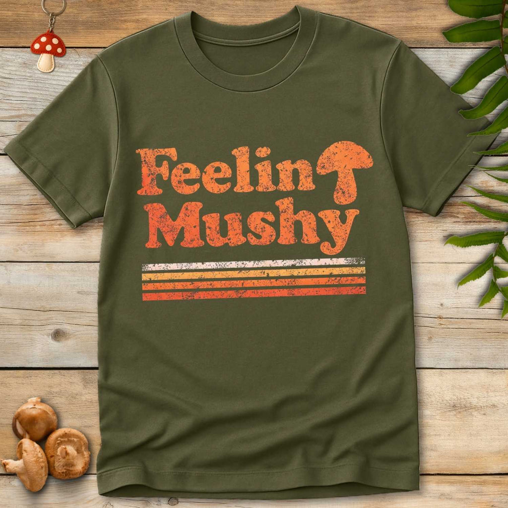 Retro-style text “Feelin’ Mushy” in orange with a mushroom , and sunset-colored horizontal stripes below.