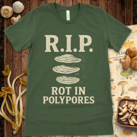 T-shirt graphic with the phrase “R.I.P. Rot In Polypores” above stylized shelf mushrooms, printed in beige on Green background