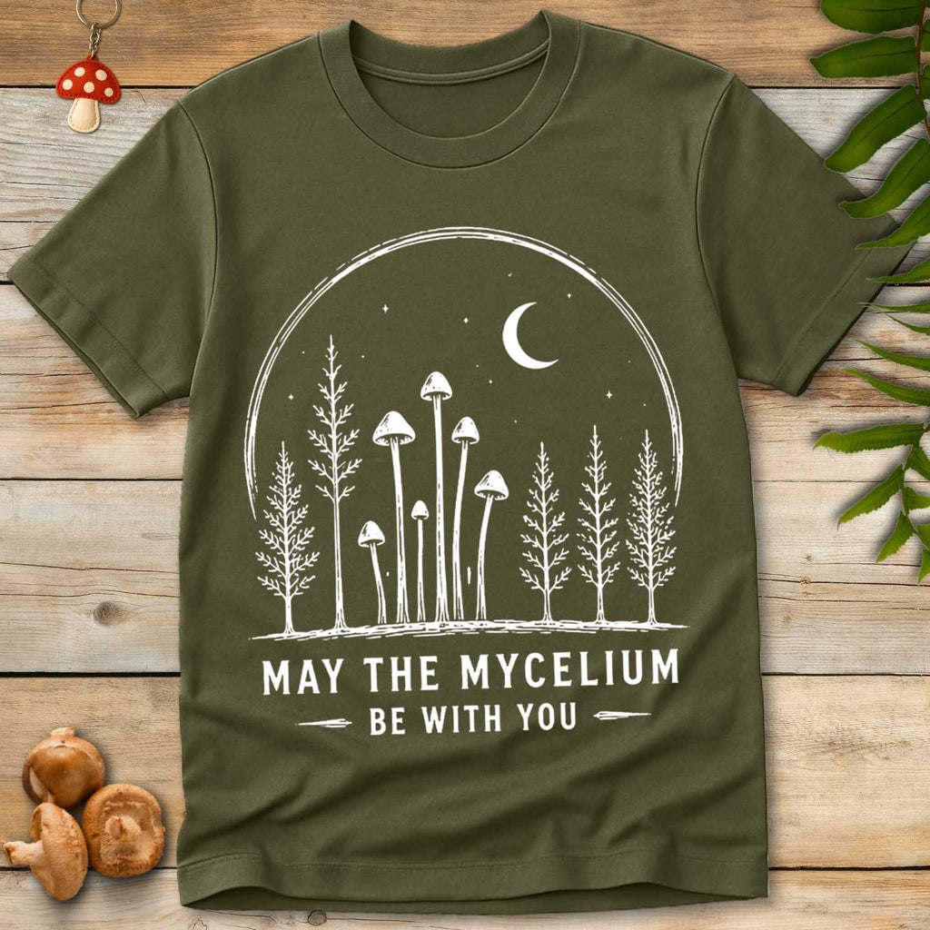Mycelium With You Tee featuring woodland mushrooms, moonlit forest trees, stars, and the phrase “May The Mycelium Be With You.”