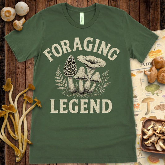 “Foraging Legend” graphic tee with detailed mushroom and foliage illustration for mushroom hunters and nature lovers
