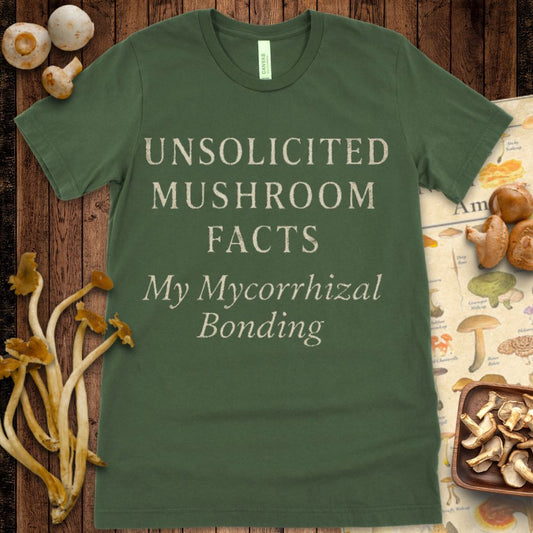 Cream text on black T-shirt design reading “Unsolicited Mushroom Facts – My Mycorrhizal Bonding” in serif font