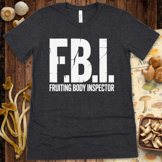 Distressed-style Grey and white T-shirt design with bold “F.B.I.” text and “Fruiting Body Inspector” in cracked block letters