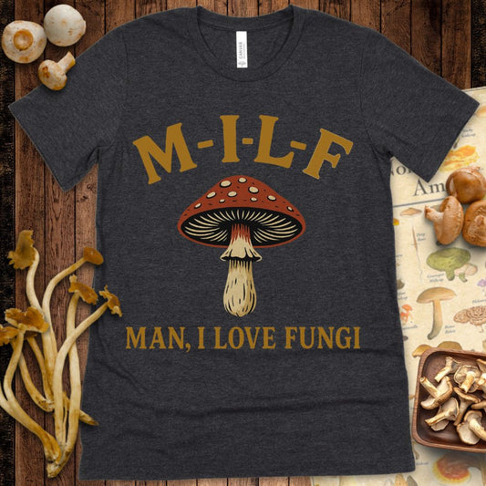 Vintage-style T-shirt with the acronym M.I.L.F. above an illustrated amanita mushroom and the phrase "Man, I Love Fungi"