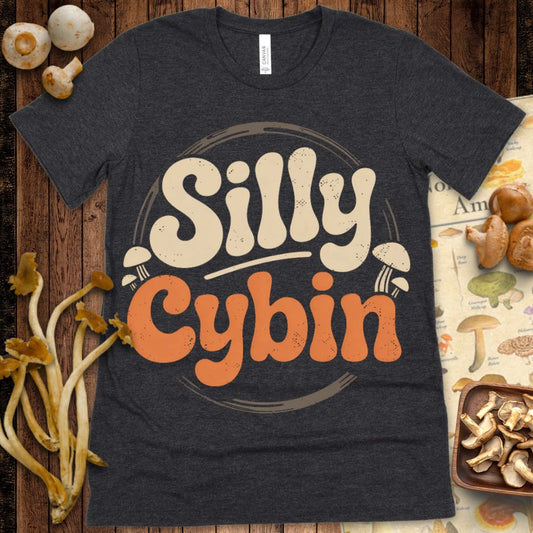 Retro-style “Silly Cybin” text with cream and orange bubbly letters, accented by small mushrooms and a vintage circle background.