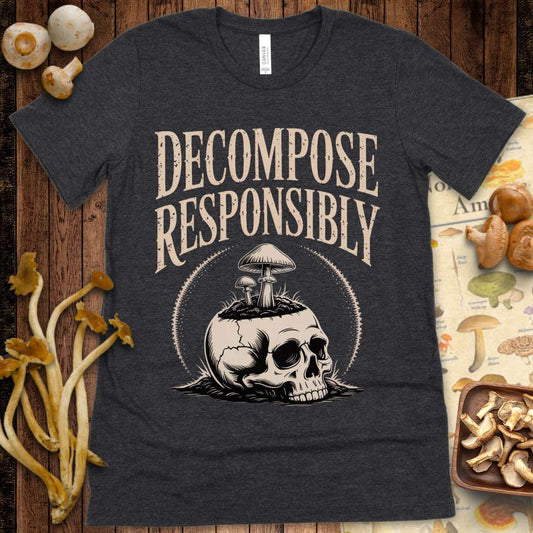 T-shirt graphic featuring mushrooms growing from a cracked skull with the words “Decompose Responsibly” above