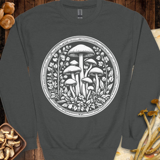 Shroom Medallion Sweatshirt featuring intricate mushrooms and foliage framed in a circular botanical medallion in black and white