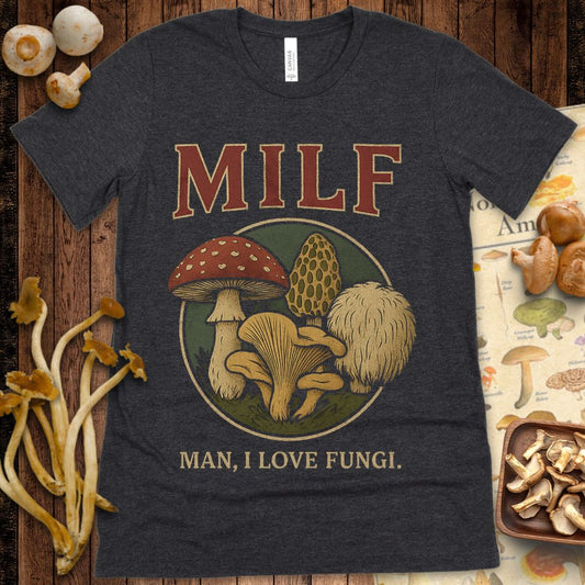 T-shirt design with the word "MILF" above four illustrated mushrooms and the caption "Man, I Love Fungi"