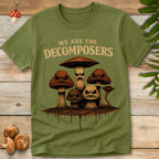 Angry cartoon mushrooms grouped together with the phrase “we are the decomposers” in a distressed vintage style