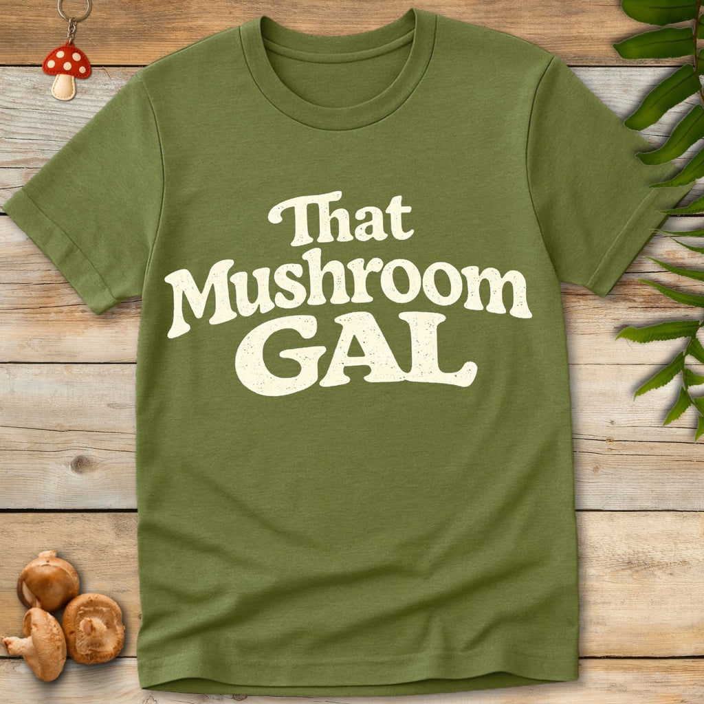 Retro style typography reading “That Mushroom Gal” in a bold cream font on a green background