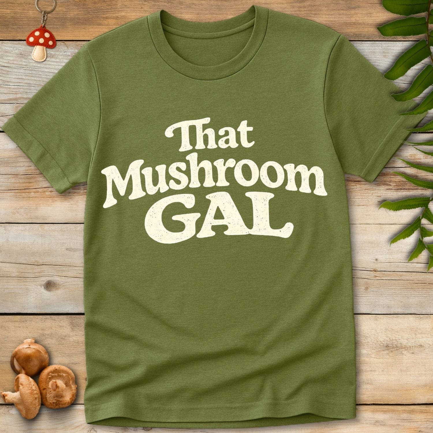 Retro style typography reading “That Mushroom Gal” in a bold cream font on a green background