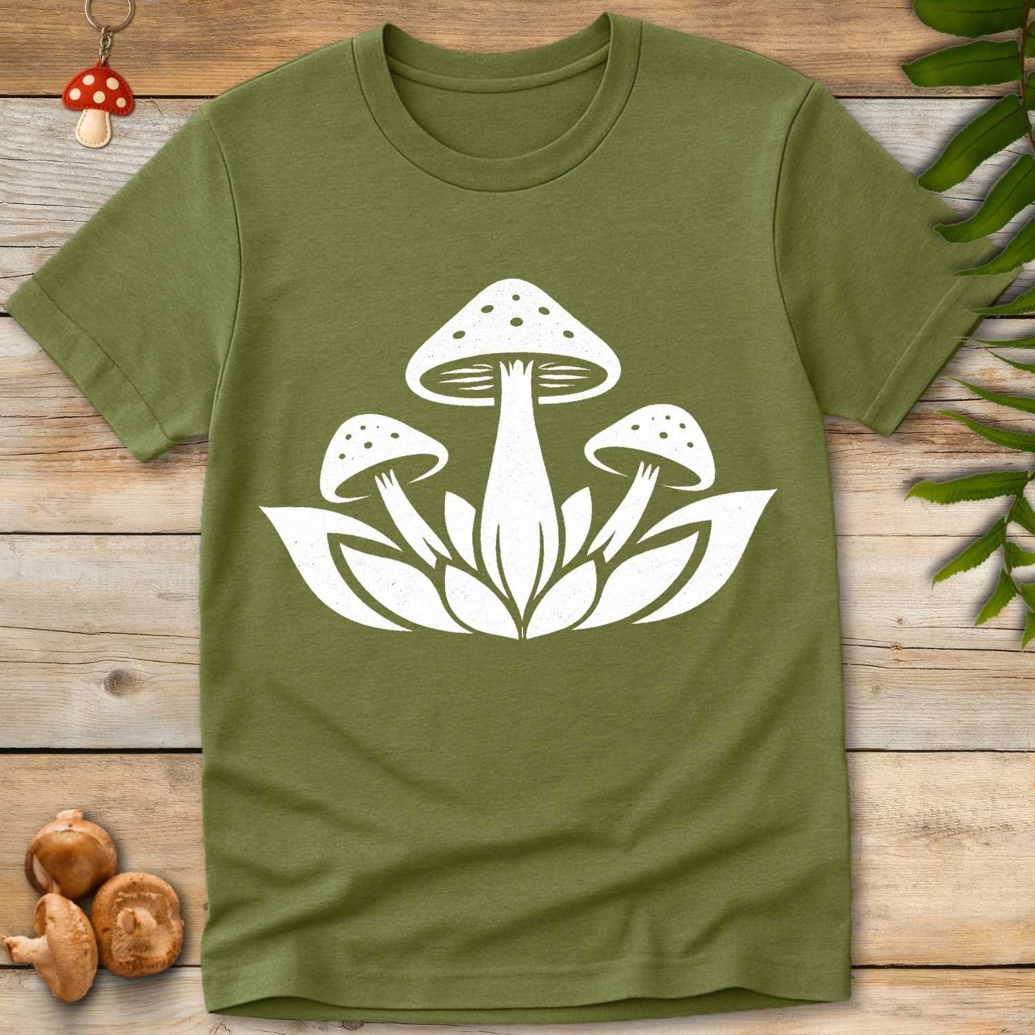 Minimalist white illustration of three mushrooms growing from a lotus flower in a clean, symmetrical design on a green background.