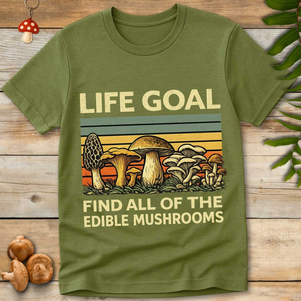 Retro-style T-shirt design with edible mushrooms and text “Life Goal – Find All of the Edible Mushrooms”