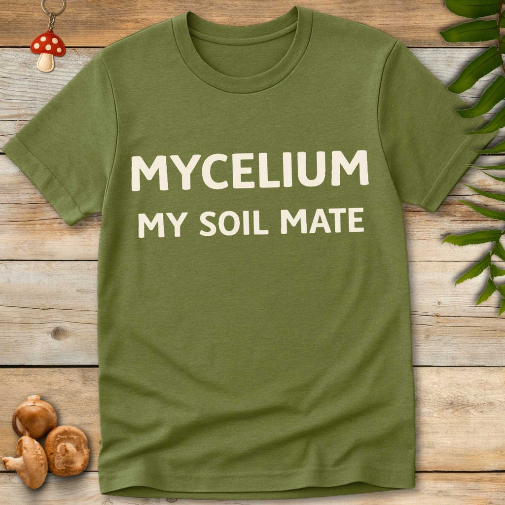 Minimalist beige text on a green shirt reading “Mycelium My Soil Mate” in bold, modern font