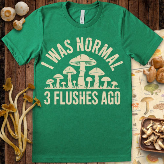Normal Flushes Tee featuring mushrooms with the phrase “I Was Normal 3 Flushes Ago,” a funny mushroom grower design.