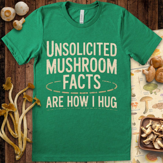 Retro-style T-shirt design with the phrase "Unsolicited Mushroom Facts Are How I Hug" in bold distressed lettering