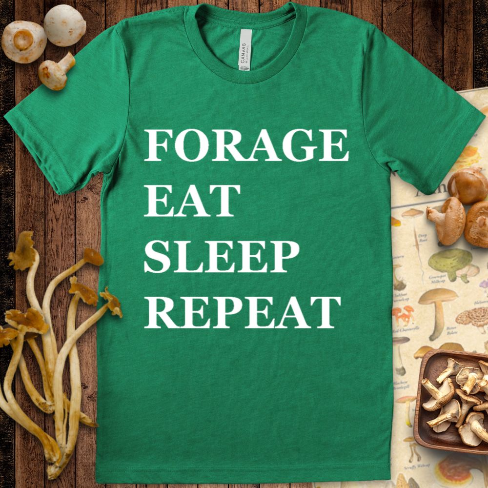 Black t-shirt with bold white text reading “Forage, Eat, Sleep, Repeat” in all caps.
