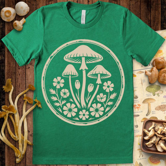 Circular vintage design featuring mushrooms and wildflowers on a graphic t