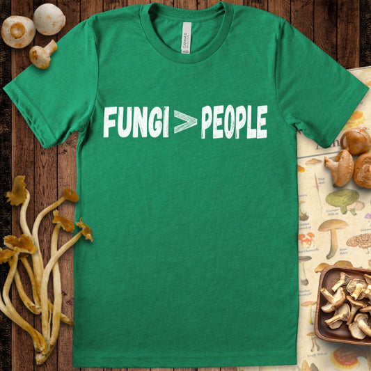 Minimalist T-shirt design with distressed text reading “Fungi > People” in white on Lite Green background