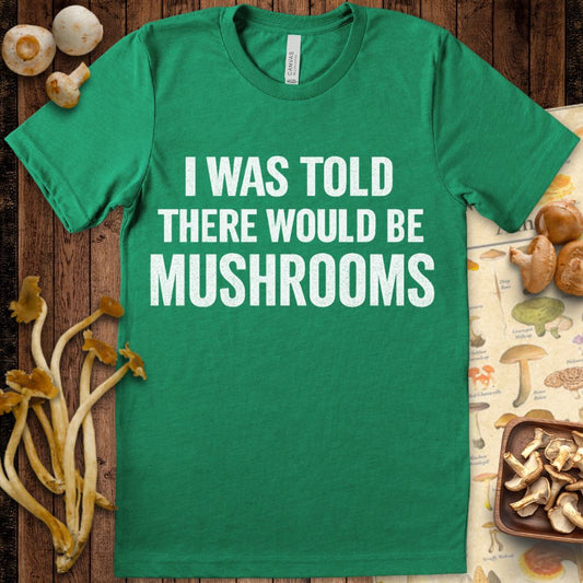 White distressed text on black reading “I Was Told There Would Be Mushrooms” in bold font
