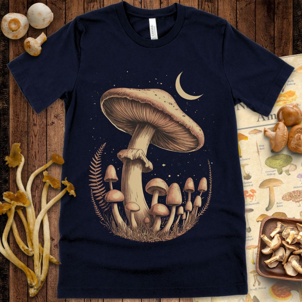 Illustration of large mushrooms under a crescent moon with stars and fern accents, evoking a mystical, vintage forest vibe.