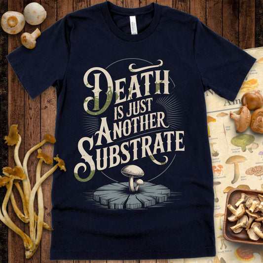 T-shirt design with the phrase "Death is Just Another Substrate" and mushrooms growing from a tree stump in vintage style