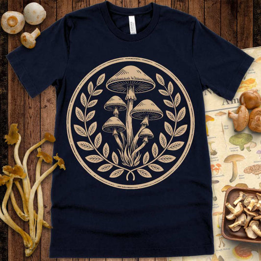 Vintage botanical mushroom illustration with laurel leaf border on a black T-shirt design