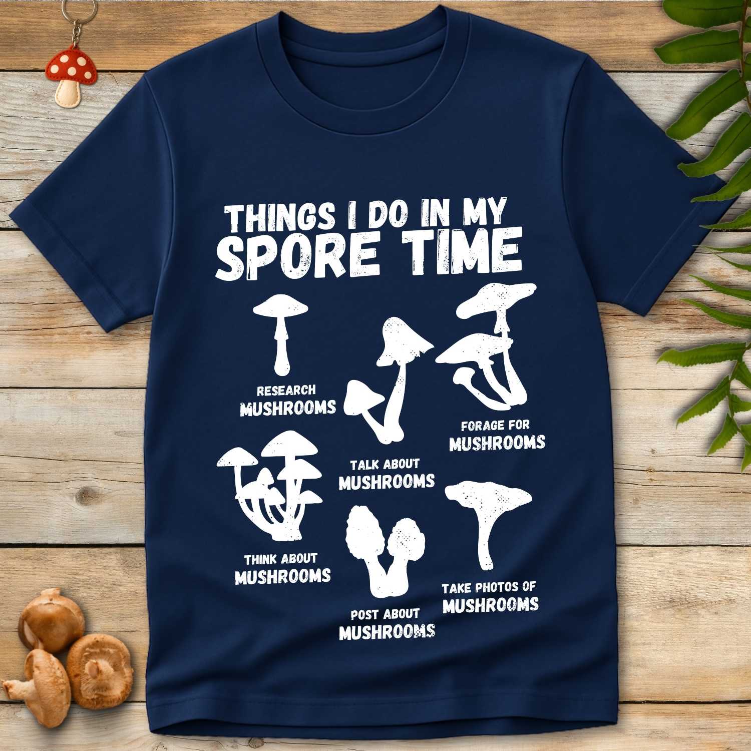 Funny white mushroom-themed graphic T-shirt with text “Things I Do In My Spore Time” and illustrations of mushroom activities