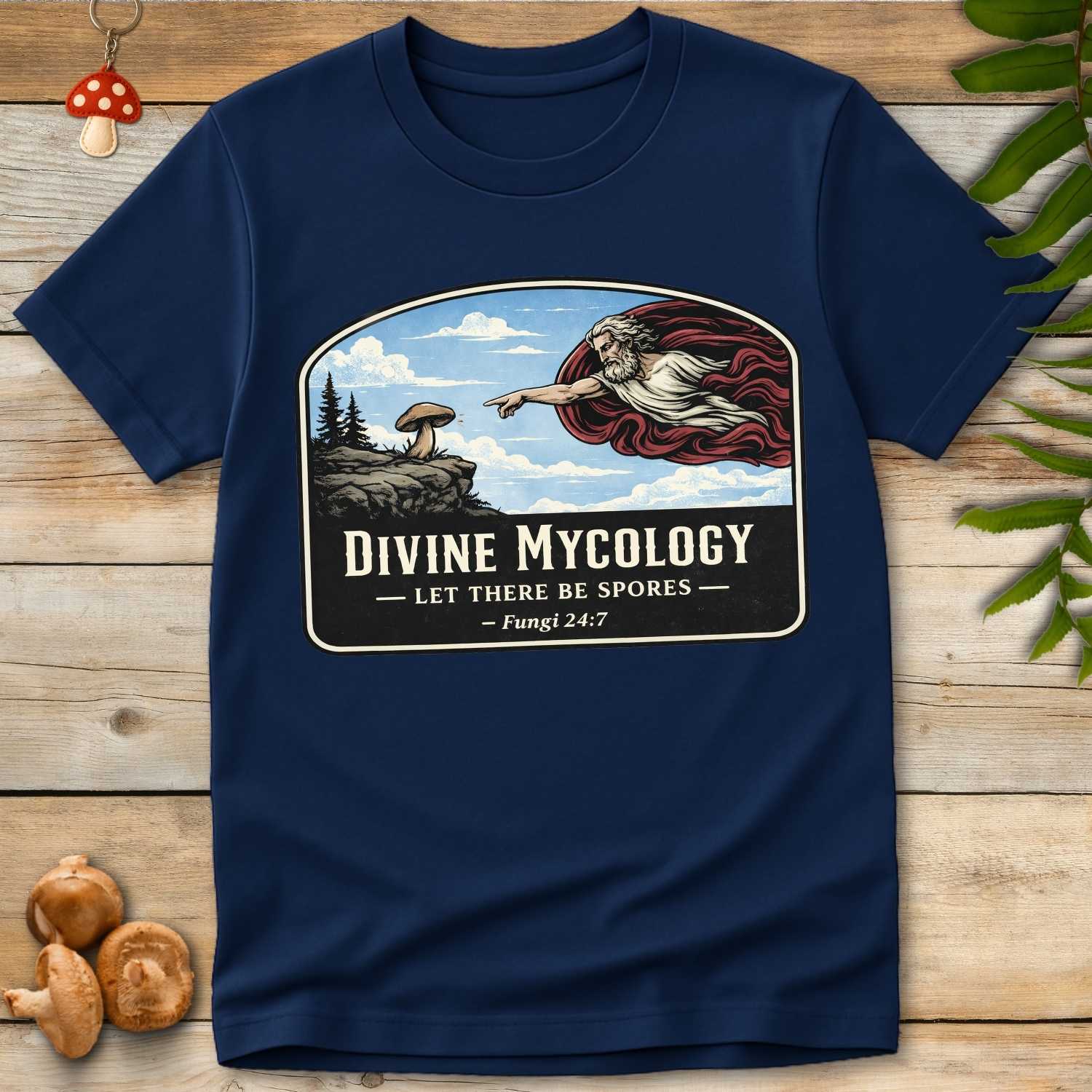 Vintage style illustration of a divine figure reaching toward a mushroom with the text “Divine Mycology – Let There Be Spores – Fungi 24:7”.