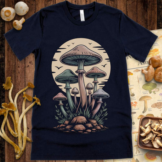 Two white mushrooms on a mossy mound floating in rippling water on a graphic tee