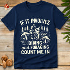 Vintage style design reading “If It Involves Biking and Foraging Count Me In” with a cyclist, pine trees, mushrooms, and a basket.