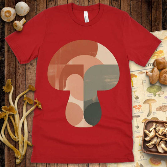 Geometric abstract mushroom design in earthy mid-century modern colors on a graphic tee