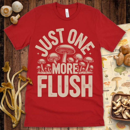 One More Flush Tee featuring the phrase “Just One More Flush” with illustrated mushrooms, ideal for mushroom growers and mycology fans.