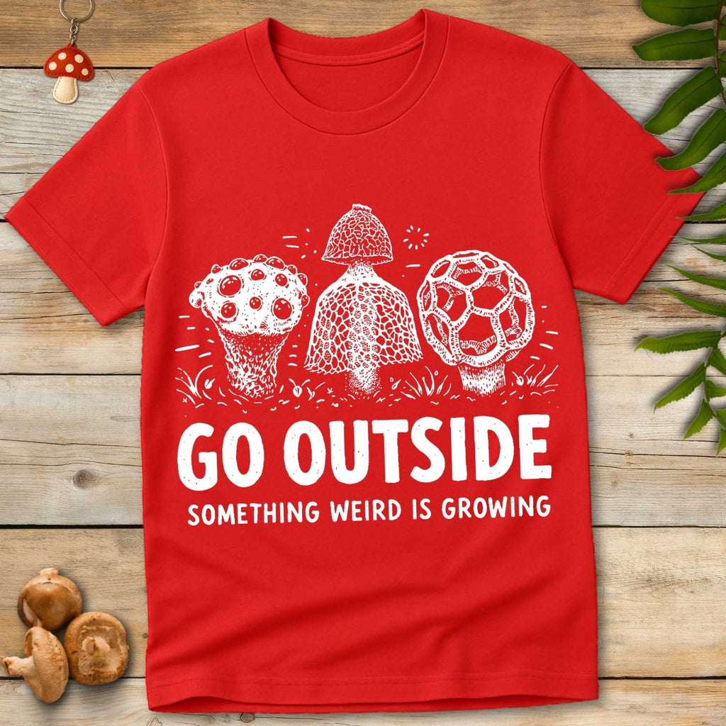 Vintage style illustration of three strange mushrooms with the phrase “Go Outside Something Weird Is Growing”.